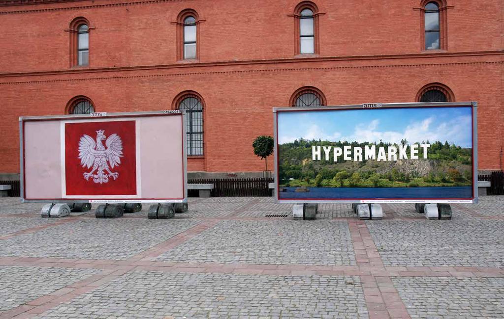 2008, Torun / Poland, Art Moves Festival (Galeria Rusz) TAM, TAM, TAM ZA TOU DUHOU, ZA MODROU HOROU A SNAD JEŠTĚ DÁL, 2007, billboard Ústředním motivem billboardu je nápis HYPERMARKET.