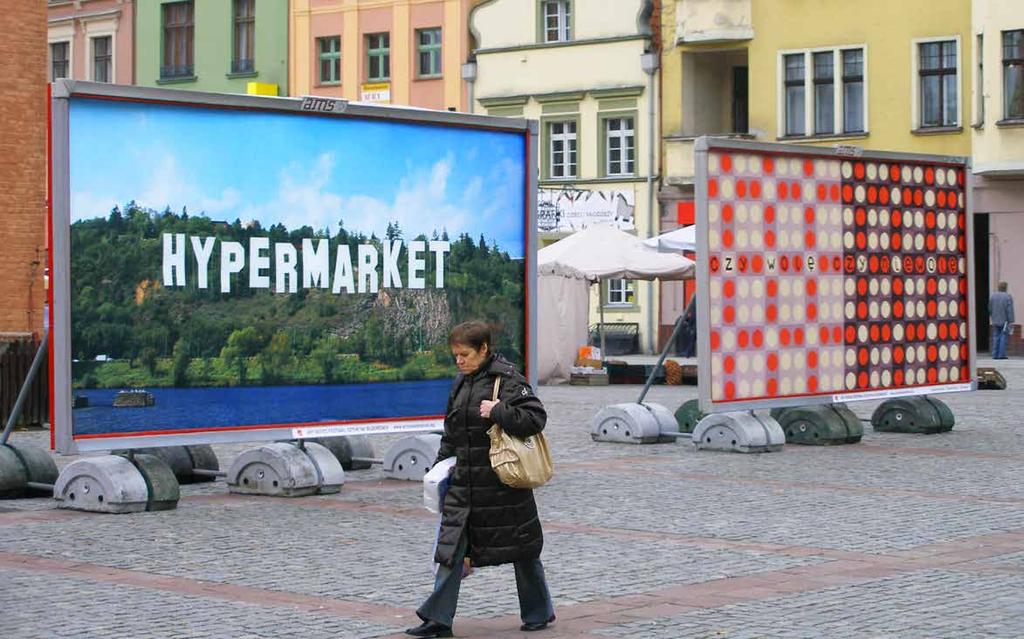 2008, Torun / Poland, Art Moves Festival (Galeria Rusz) TAM, TAM, TAM ZA TOU DUHOU, ZA MODROU HOROU A SNAD JEŠTĚ DÁL, 2007, billboard Ústředním motivem billboardu je nápis HYPERMARKET.