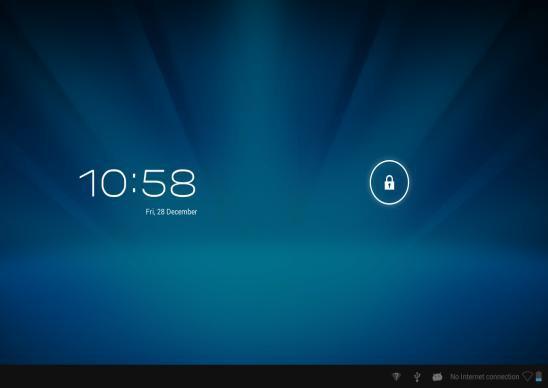 Začínáme Zapnutí Tablet zapnete zapínacím tlačítkem. Po naběhnutí musíte displej odemknout posunutím ukazatele zámku do strany.