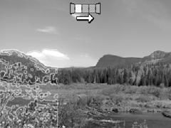 Kapitola 3 Použití režimu Panorama Režim / Panorama umožňuje pořídit sekvenci 2 až 5 snímků, které lze spojit dohromady, a vytvořit tak scénu, která je příliš rozsáhlá pro jeden snímek.