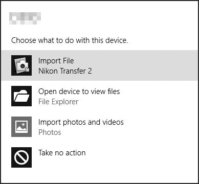 1 V části Import pictures and videos (Importovat snímky a videosekvence) klepněte na možnost Change program (Změnit program).
