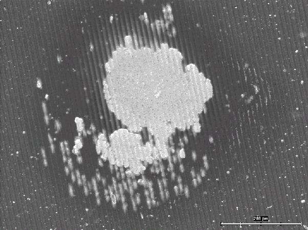 E= 0.044 J; 5000 impactů