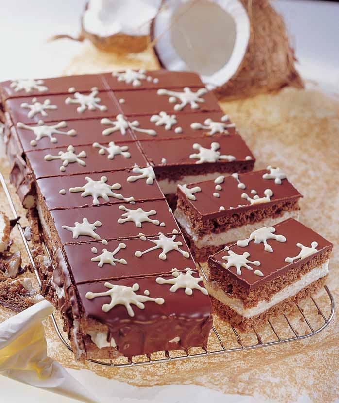 4 Ïloutky 90 g mouãkového cukru 4 bílky 100 g hladké mouky 2 PL kakaa 1 KL Kypfiicího prá ku do peãiva Dr.Oetker 100 g rozdrcen ch lískov ch ofií kû Na krém: 1 Dortová náplà vanilková Dr.