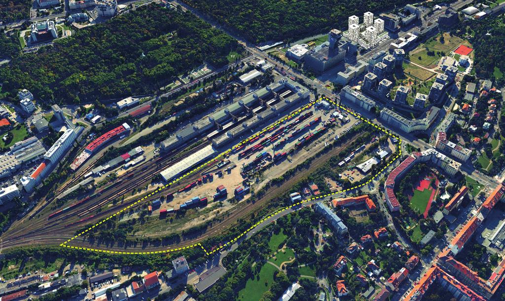 Sever nákladového nádraží Žižkov dnes North of the Žižkov freight train station today V této době se jedná o nepřístupný, kontaminovaný a dlouhodobě zanedbaný brownfield o velikosti 128.000 m2.