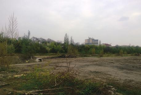 The former owner had been awarded a zoning permit to build a large commercial and office center, hotel and two apartment buildings on this site.