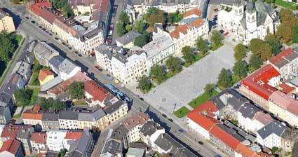 století Moravská Ostrava bloková zástavba centra města velkoměstský ráz s ustálenou výškovou hladinou budov a uliční sítí s novými náměstími.