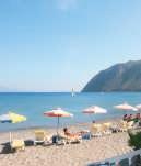Na pláži Agios Stefanos naleznete i školu windsurfingu a půjčovnu vybavení.
