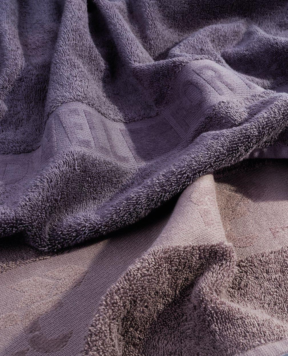 Using chenille yarn for making plastic signs or logos without excelling in the area withou loops, in the bordure. Chenille creates a velvet effect and act nice to the touch.