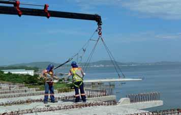 4 Progressive erection of the deck: a) precast segment, b) outer precast struts, c) precast slab panels, d) cast-in-place