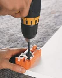 MOVENTO, TANDEM 1 x univerzální vrtací šablona, 1 x hloubková zarážka vrtáku (Ø 10 mm), 1 x hloubková zarážka vrtáku (Ø 5 mm), 1 x označovač s hroty (Ø 10 mm), 1 x označovač s hroty (Ø 5 mm) ZML.0040.