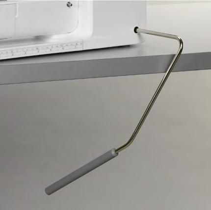 Příprava Kolenní páka FHS (Free Hand System) (pro B 335 pouze k dokoupení) Kolenní páka zdvihá a spouští přítlačnou patku.