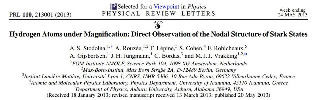 The atom is placed in an electric field EE and excited by laser pulses (shown in