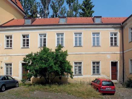 [7], [10]; b) pamětní deska na budově v Praze 6