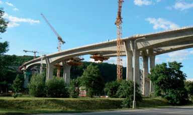 16 General view of the partially built elevated road across the Berounka valley from the Radotín tunnel mouth obr. 1 až 4 Ing. arch. Patrik Kotas Ateliér designu a architektury, obr. 5 Valbek, obr.
