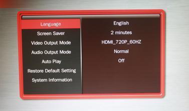 Stiskněte / tlačítka pro výběr požadované položky "Language" - Jazyk, "Screen Saver" - Šetřič obrazovky, "Video Output Mode" - Video výstup mód, "Audio Output Mode" - Audio výstup mód, "Auto Play" -