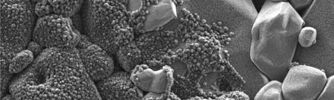 During the UV lithography the sandwich-like structure is processed and packed diamond seeds are washed out.
