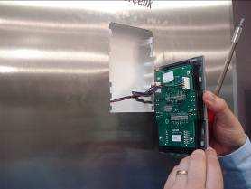 17 b) Glass door model: The display group in these products is mounted as assembled like a