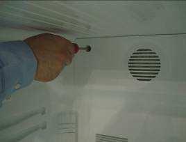 Use a Phillips screwdriver