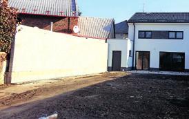 garáží o celkové užitné ploše 130 m, v centru obce.