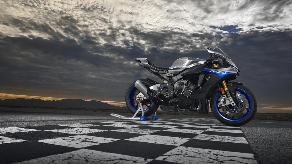 Vítejte ve SVĚTĚ STROJŮ ŘADY R. je nejvyspělejší sériově vyráběný motocykl značky Yamaha a jeho vytříbené technologie umožňují každému závodníkovi nebo jezdci na dráze odhalit svůj skutečný potenciál.