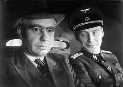b SKÁLA Vyšší princip. Režie Jiří Krejčík, FS Barrandov 1960. S Hannjo Haasem (Vrchní komisař) c LAŠTOVKA Mezi námi zloději. Režie Vladimír Čech, FS Barrandov 1963.