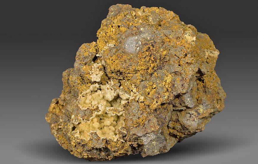 Na základě chemického složení jde o paulingit-k (Hloušek et al. 1988; Passaglia et al. 2001) 